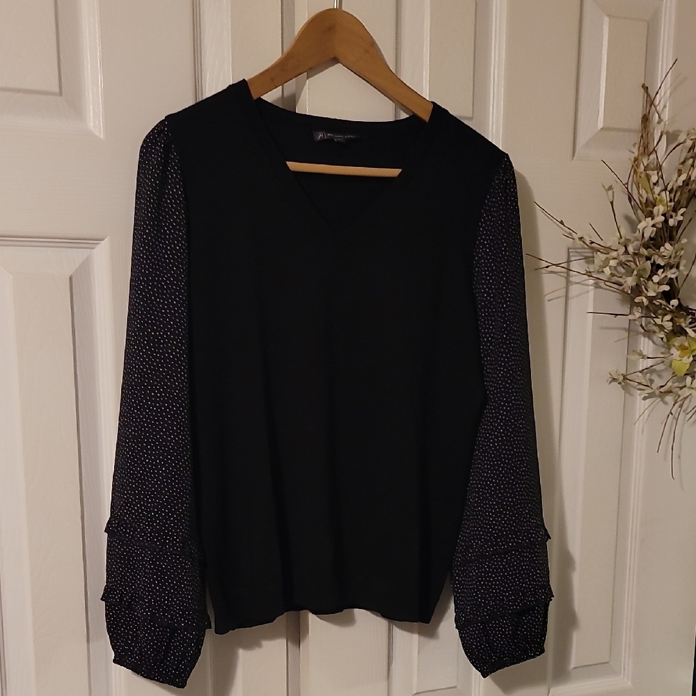 Elegant Black Women's Top with Polka Dot Sleeves